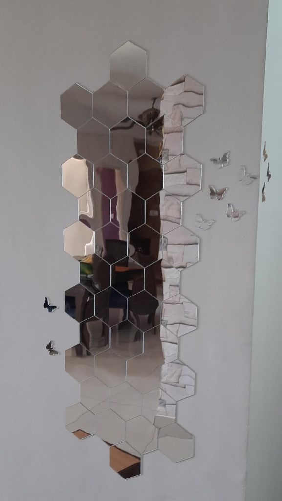 Hexagon mirror wall stickers stuck on a wall